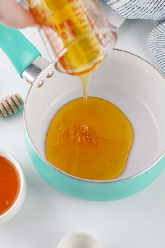 Adding liquid to the pan